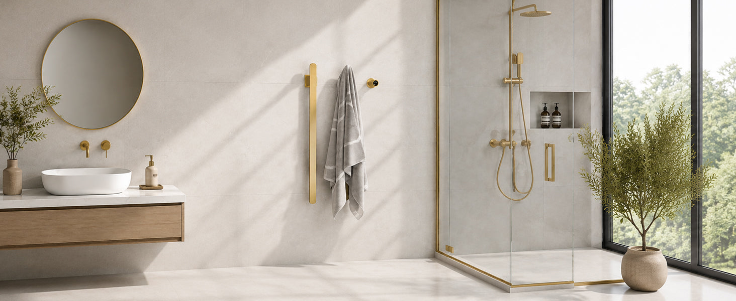 Brushed gold towel warmer in a contemporary bathroom